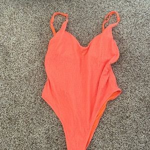 Low back, high waisted one piece bathing suit